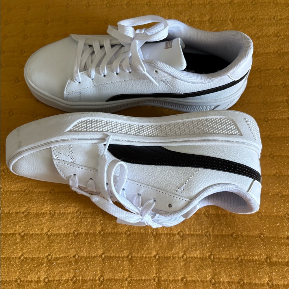 Puma White Sneakers with Black and Gold Accents